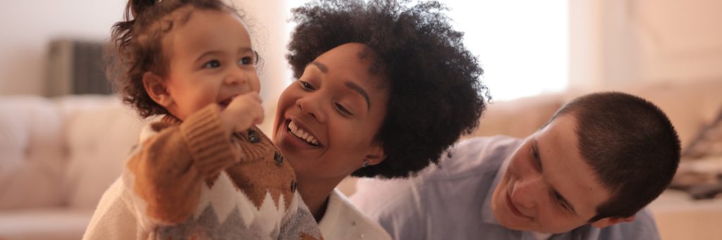 Woman holding a young child